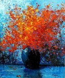 Fleurs rouges au vase noir Fleurs rouges au vase noir. ©Bruni Eric